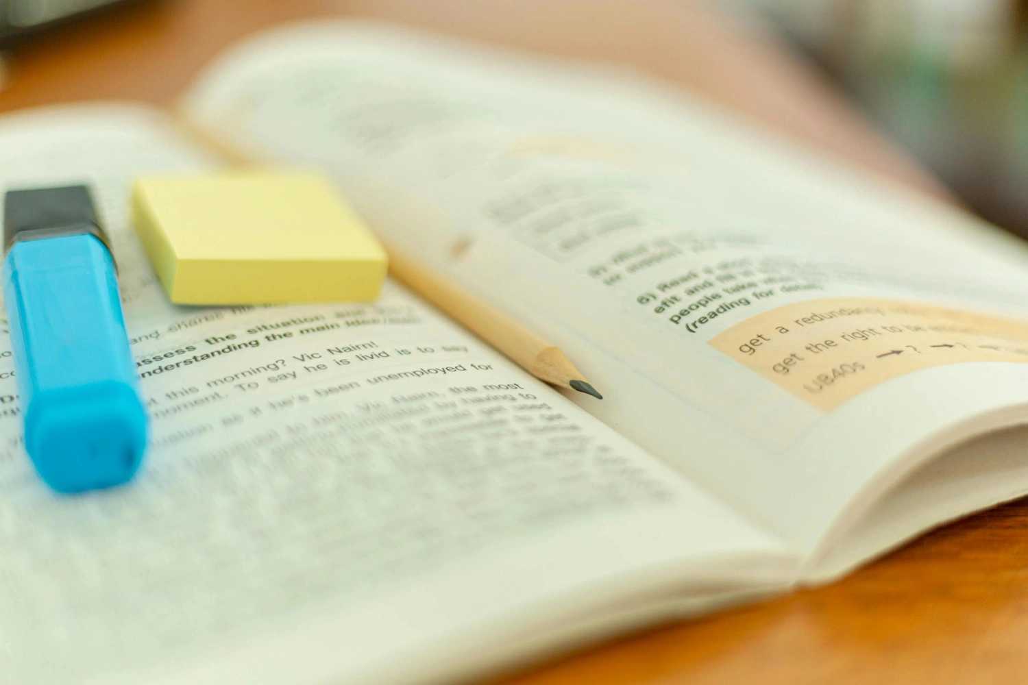 Proofreading books with a highlighter - Expert Editing and Proofreading Services in UAE